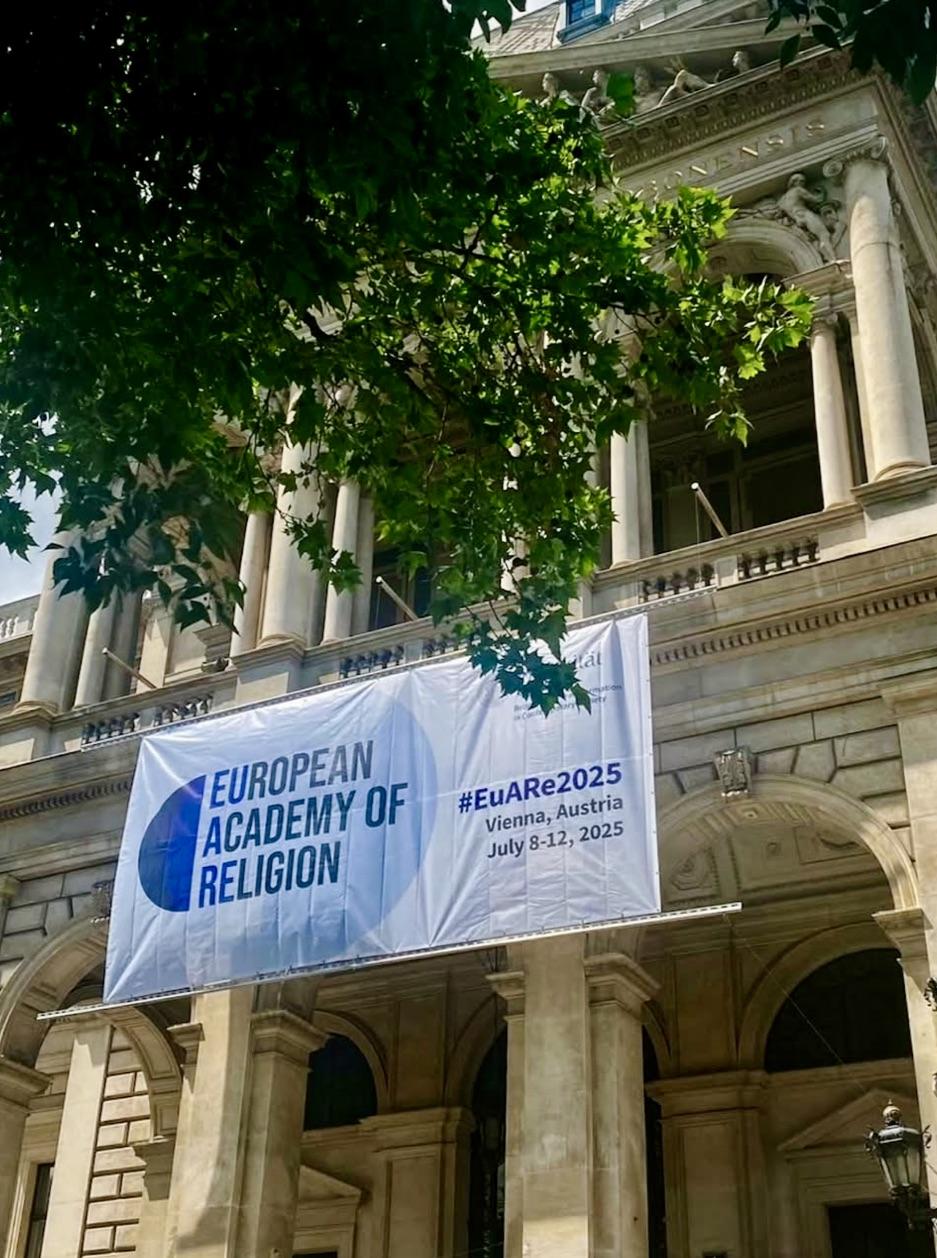 Banner of the European Academy of Religion advertising an event in Vienna, Austria in July 2025, displayed in front of a classical architecture building with ornate columns and green trees.