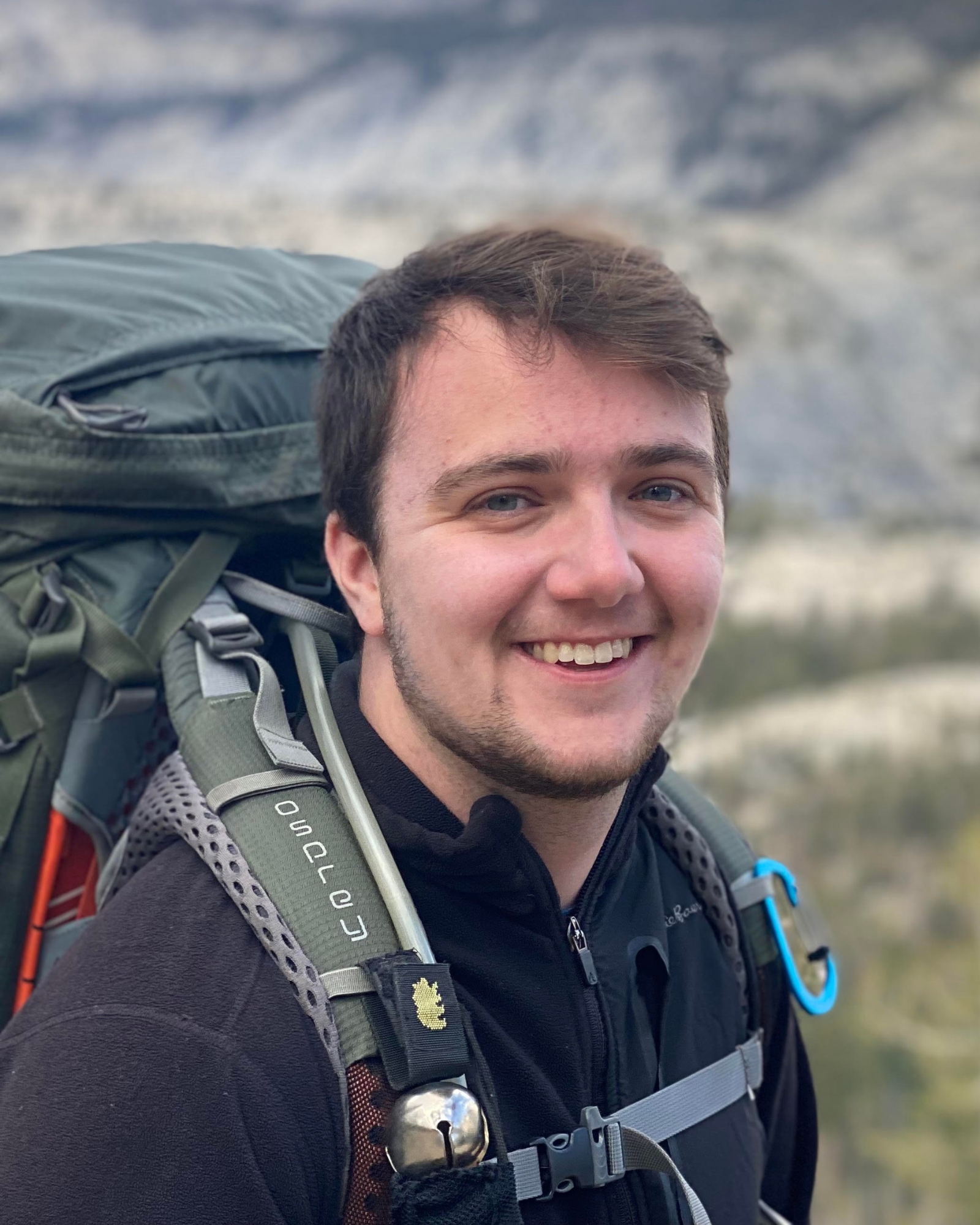 Logan Swanson on a mountain